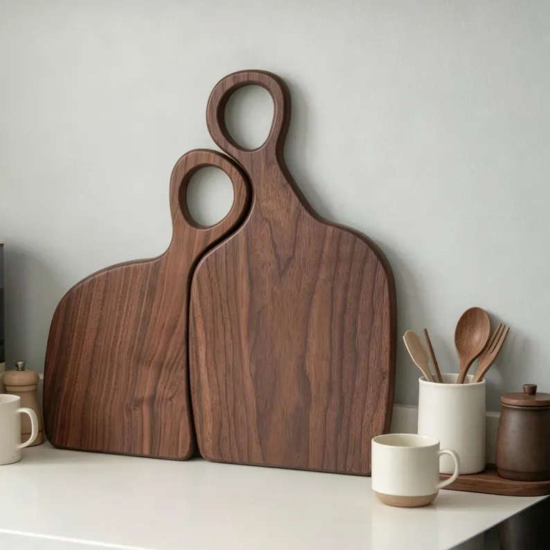 walnut-couple-charcuterie-board-with-handle.webp